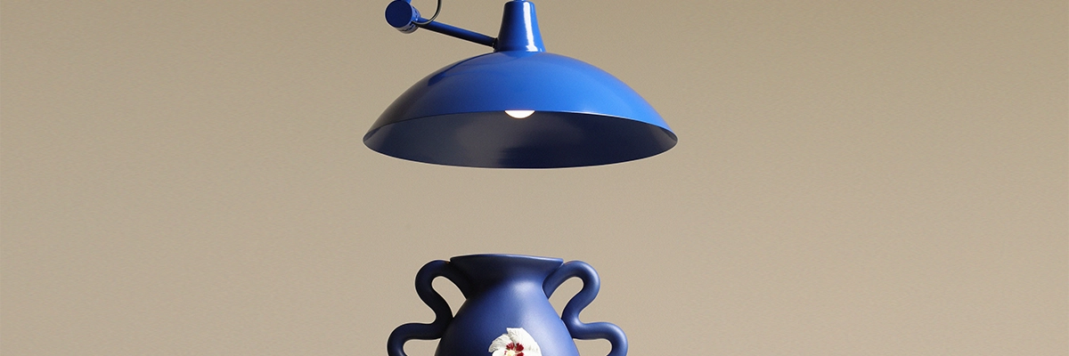 Wall lamps with an arm